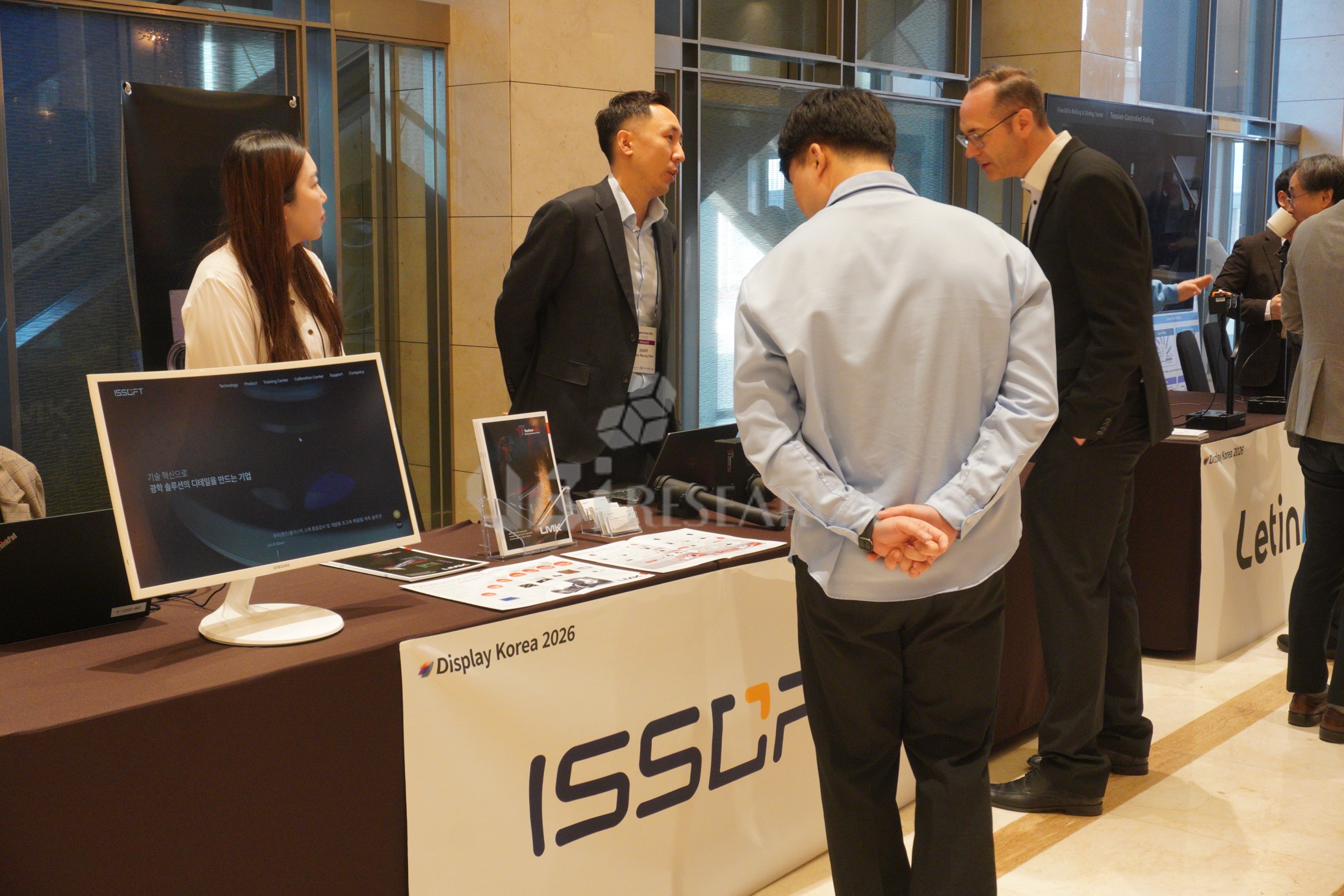 ISSOFT booth exhibiting imaging photometry and colorimetry measurement equipment for precise analysis of display luminance and uniformity