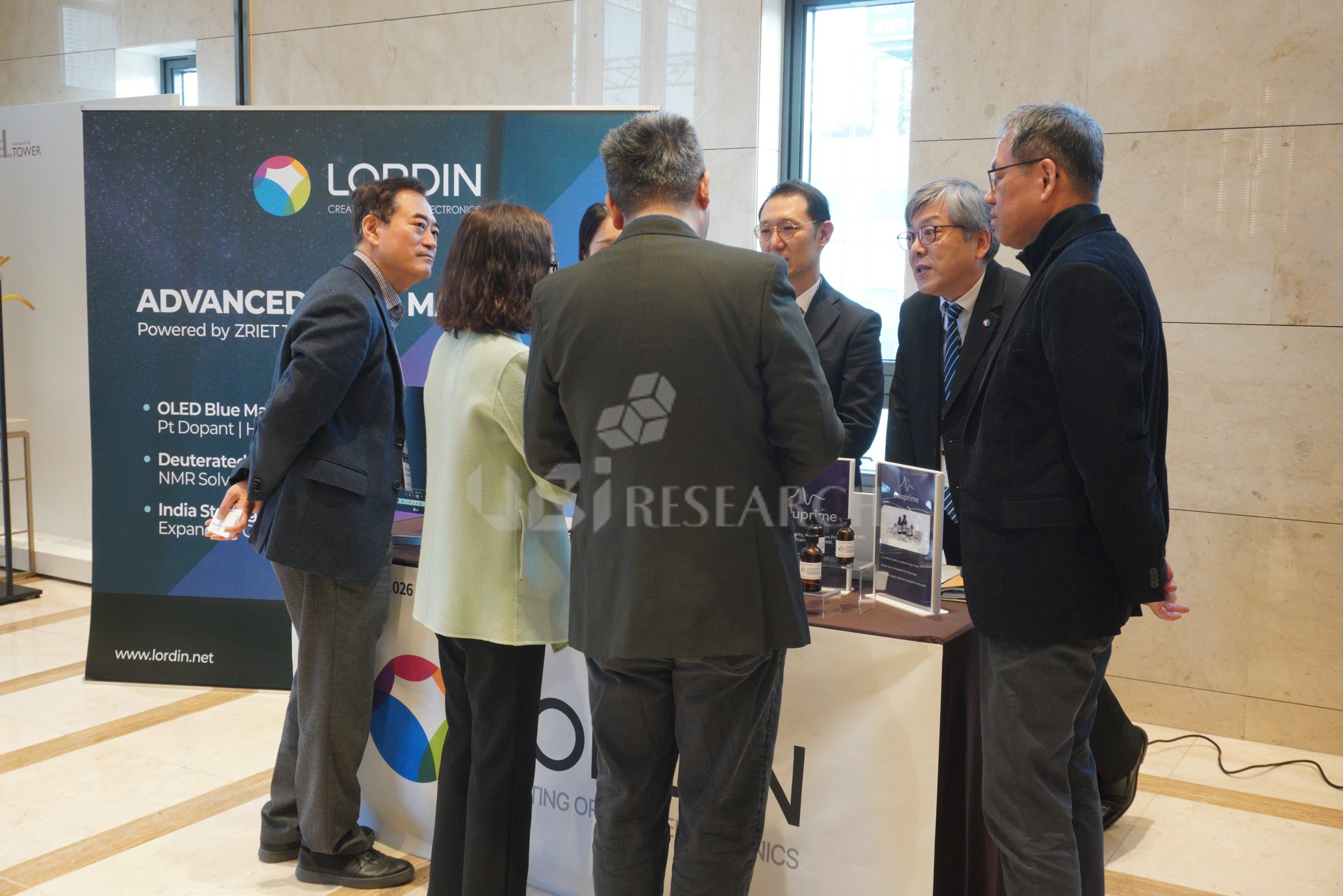 LORDIN booth exhibiting next-generation high-efficiency OLED materials, including blue emitting materials and Pt dopants