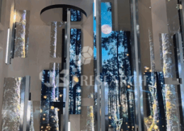 Exhibition scenes from Touch Taiwan 2026 showcasing next-generation Micro-LED displays and automotive smart cockpits by AUO, Innolux, and PlayNitride.